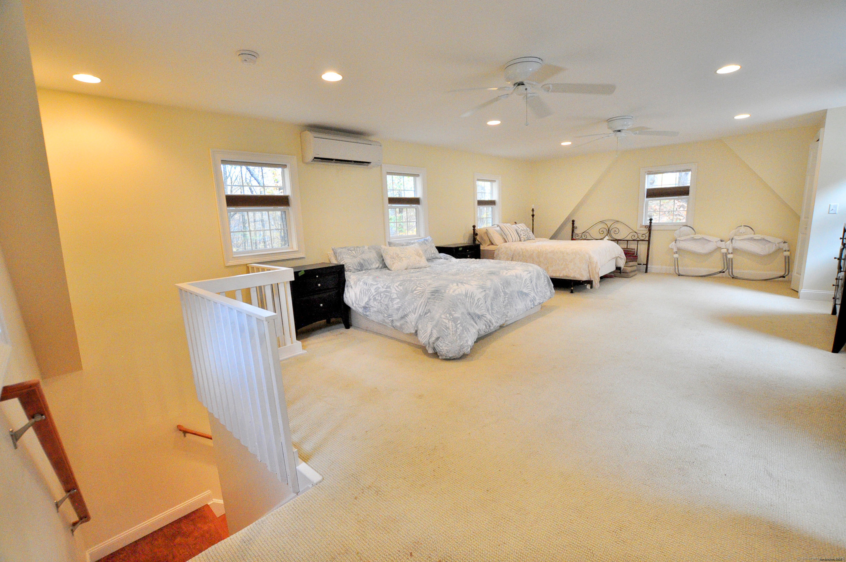 45 Lookout Landing Bolton, CT 06043 - Photo 33 of 39 a spacious bedroom with bed and a couch