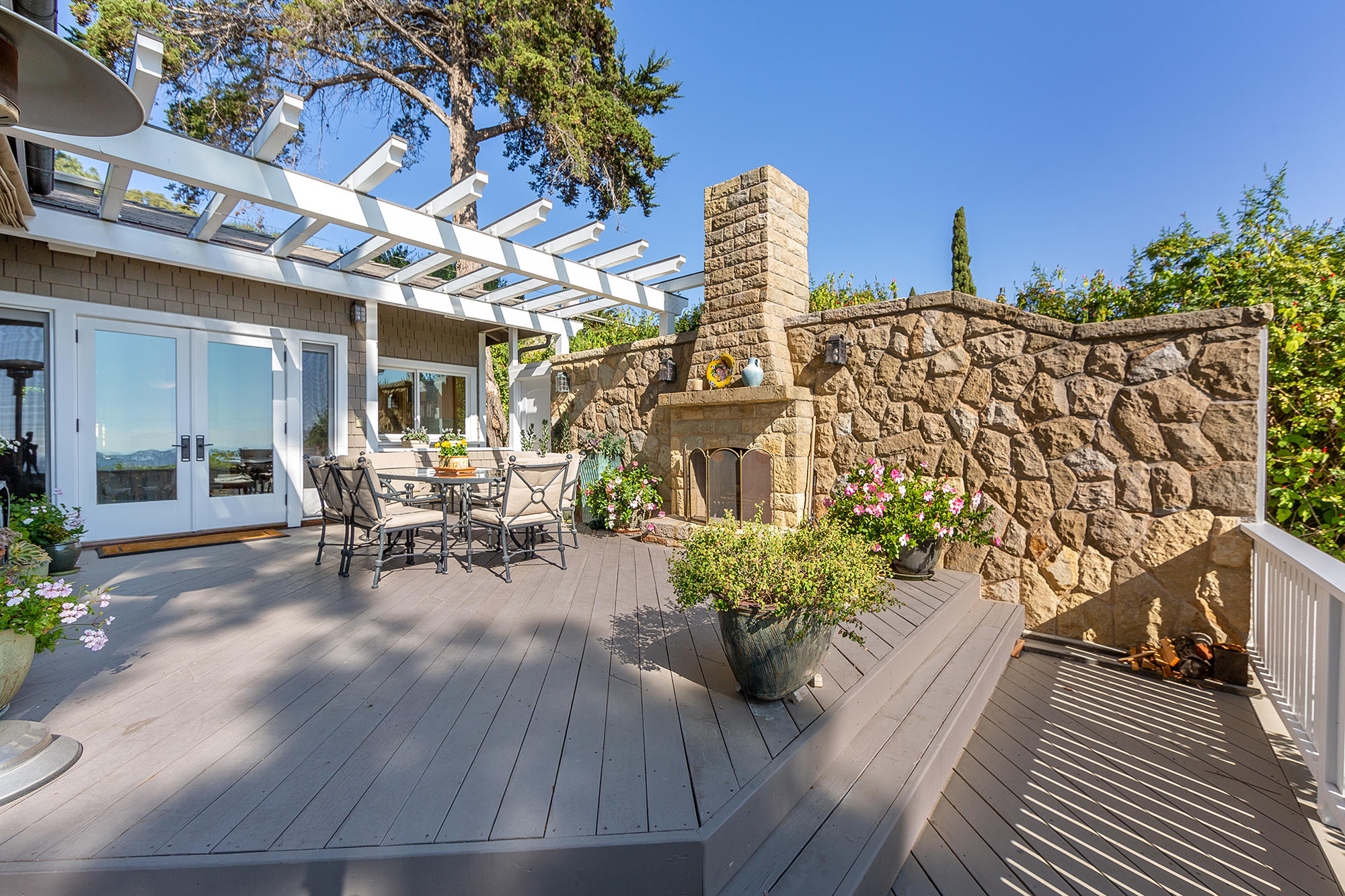 822 Jimeno Road Santa Barbara, CA 93103 - Photo 14 of 35 Dining Room & Exterior Fire Placve