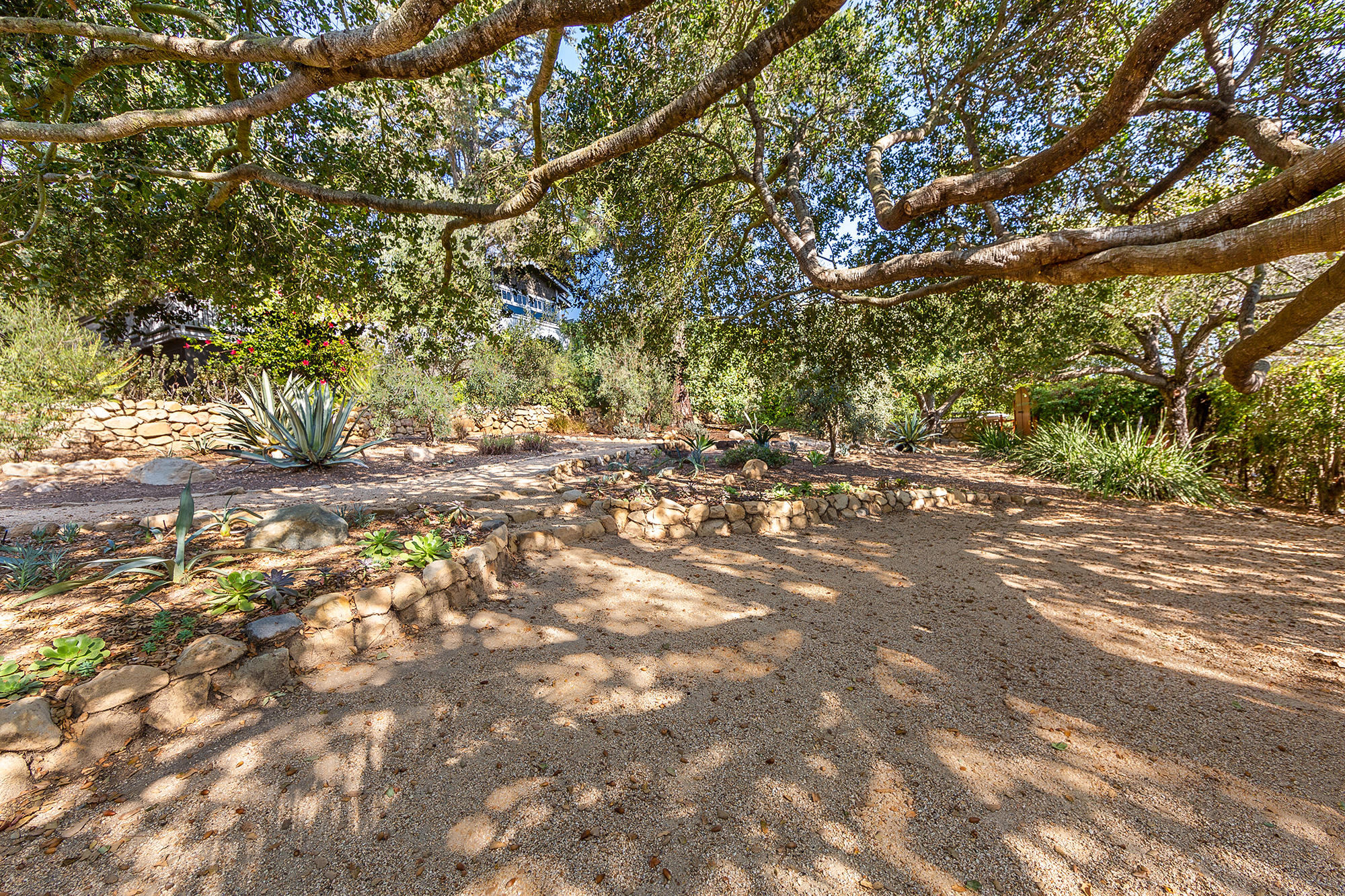 822 Jimeno Road Santa Barbara, CA 93103 - Photo 31 of 35 Private sitting areas under Oak Trees