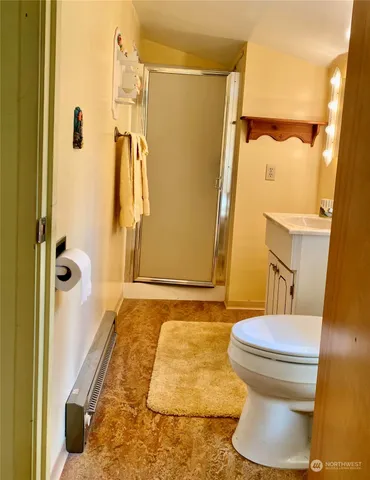 a bathroom with a sink and a shower