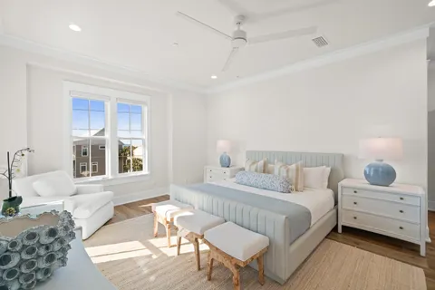 a kitchen with stainless steel appliances granite countertop a sink a stove a dining table and chairs