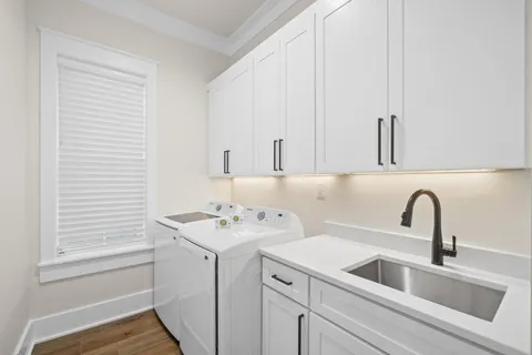 a bedroom with a large bed and a flat screen tv