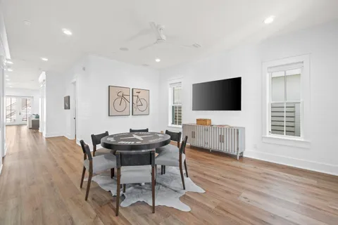 a bathroom with a shower and a glass door