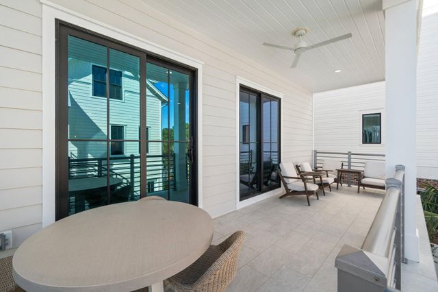 a bedroom with a bed and a flat screen tv in it
