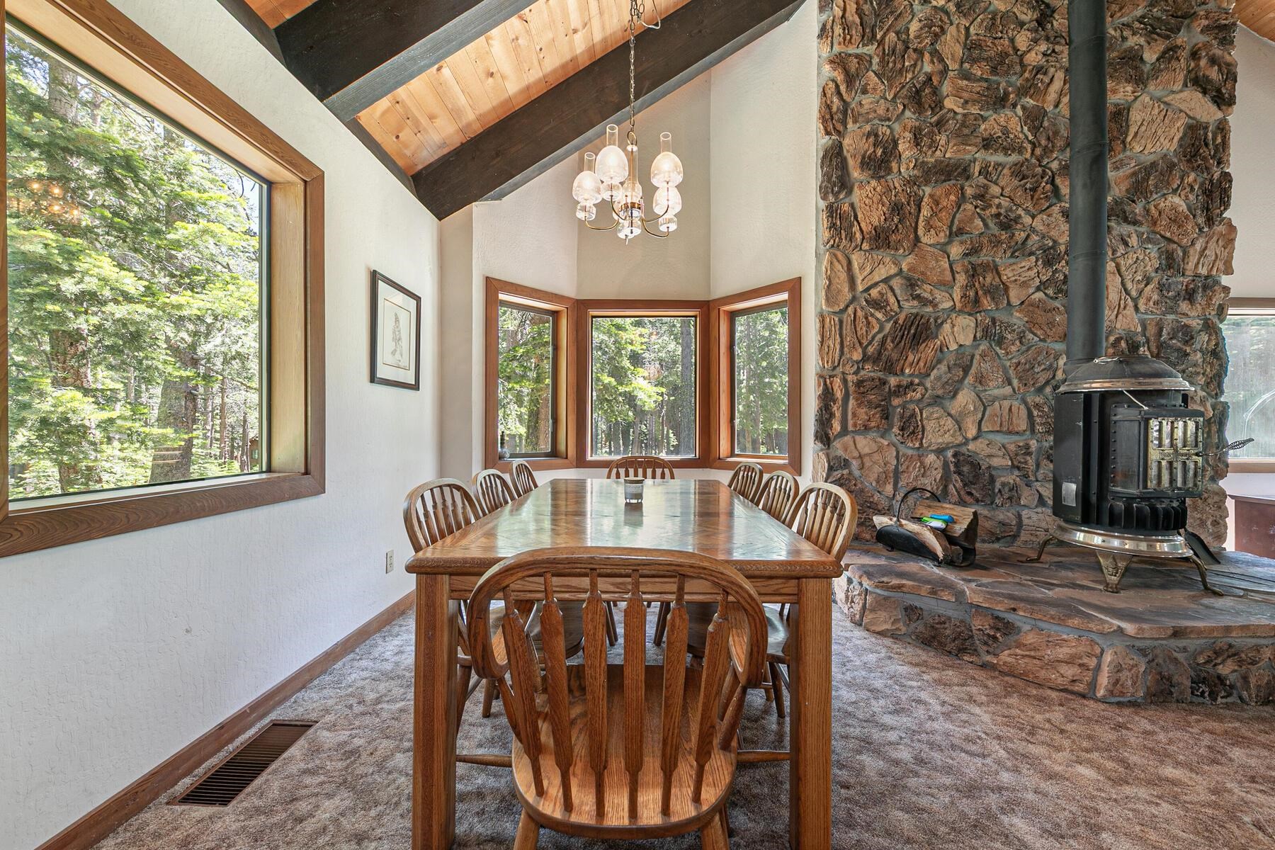 14620 Christie Lane Truckee, CA 96161 - Photo 15 of 28 a view of a dining room with furniture window and outside view