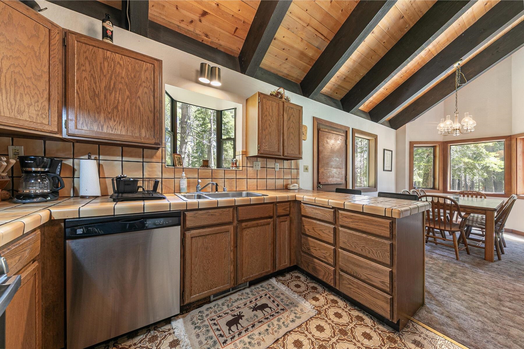 14620 Christie Lane Truckee, CA 96161 - Photo 19 of 28 a kitchen with sink cabinets and window