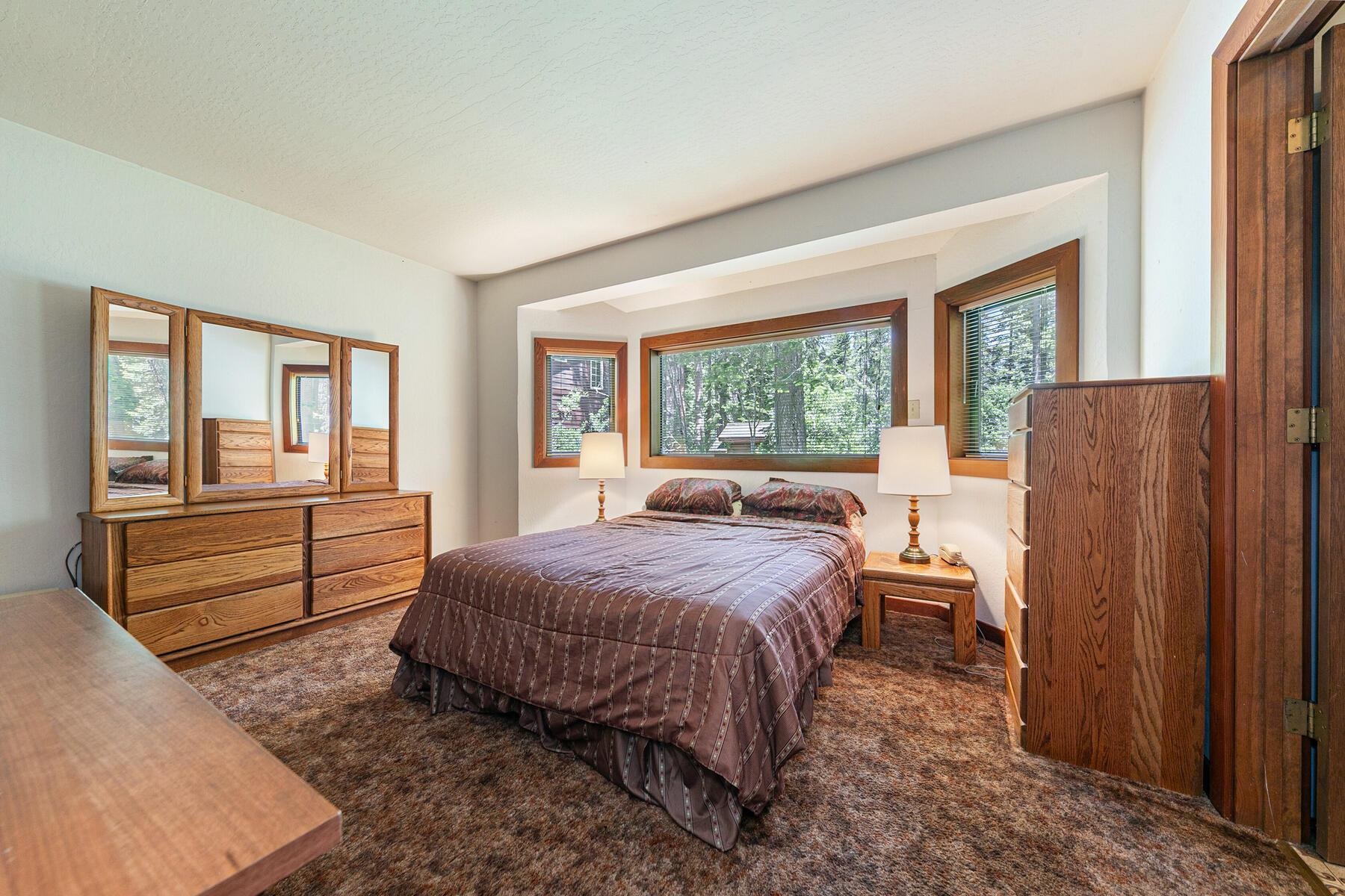 14620 Christie Lane Truckee, CA 96161 - Photo 25 of 28 a bedroom with a bed and a large window