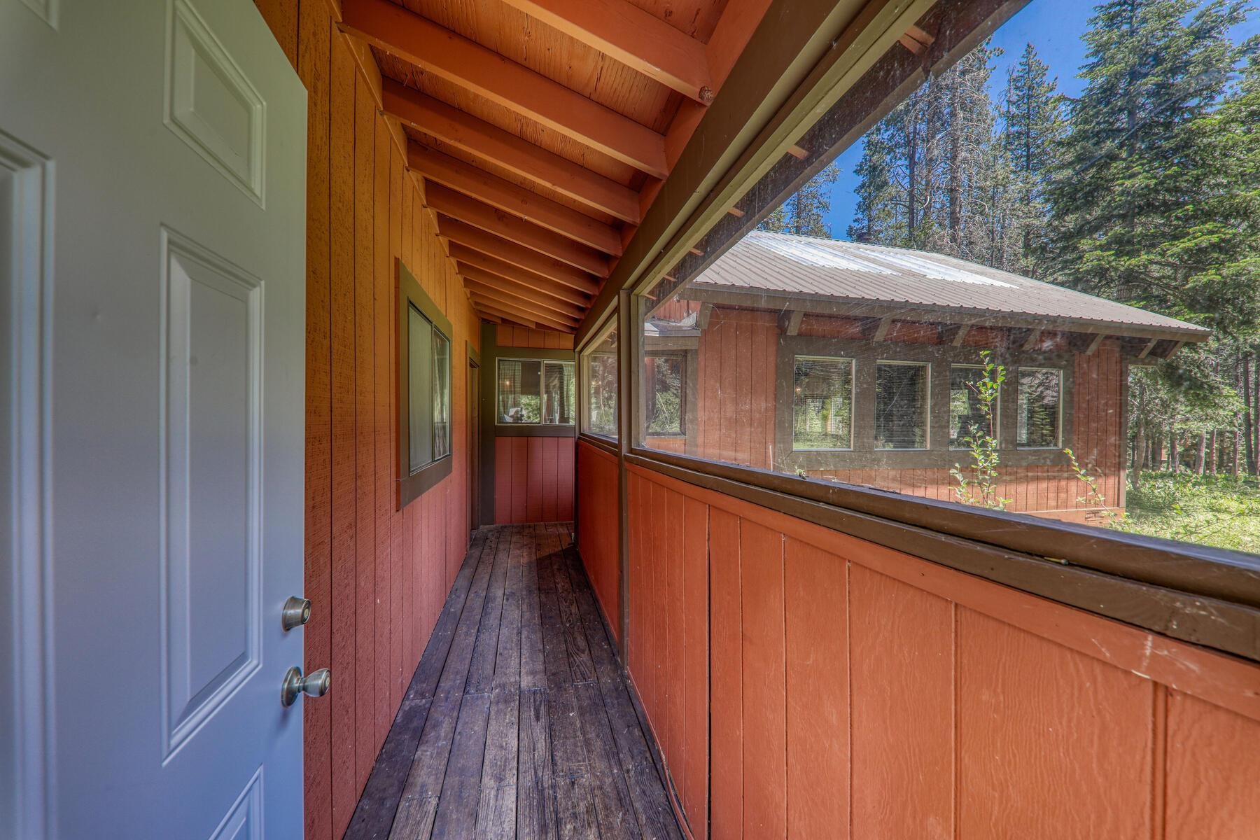 14620 Christie Lane Truckee, CA 96161 - Photo 8 of 28 a view of a house with a balcony and wooden floor