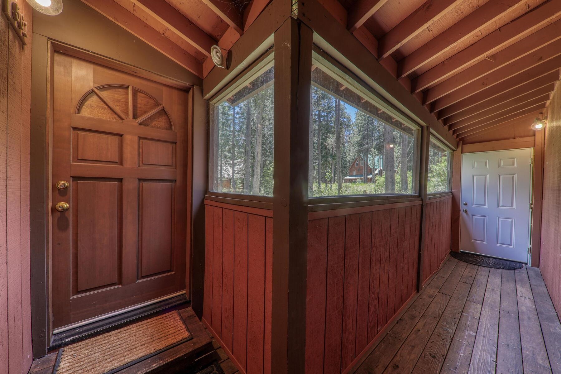 14620 Christie Lane Truckee, CA 96161 - Photo 9 of 28 a view of a porch with wooden floor and doors