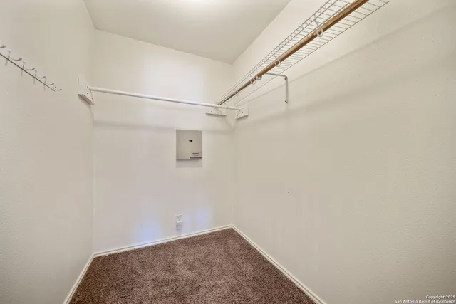 a view of small space with racks on the wall