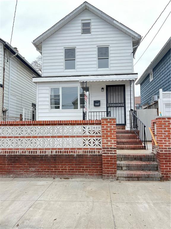 a front view of a house with a garage
