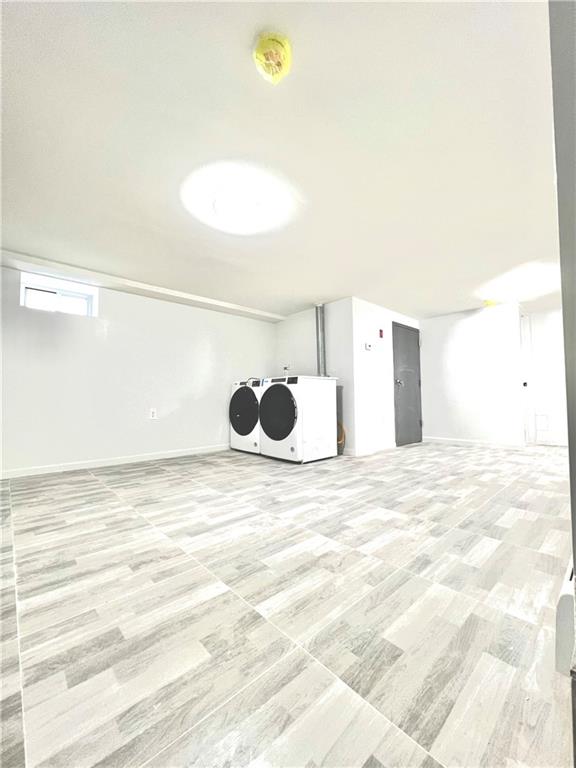 1651 85th Street Brooklyn, NY 11214 - Photo 13 of 17 a view of a livingroom with wooden floor