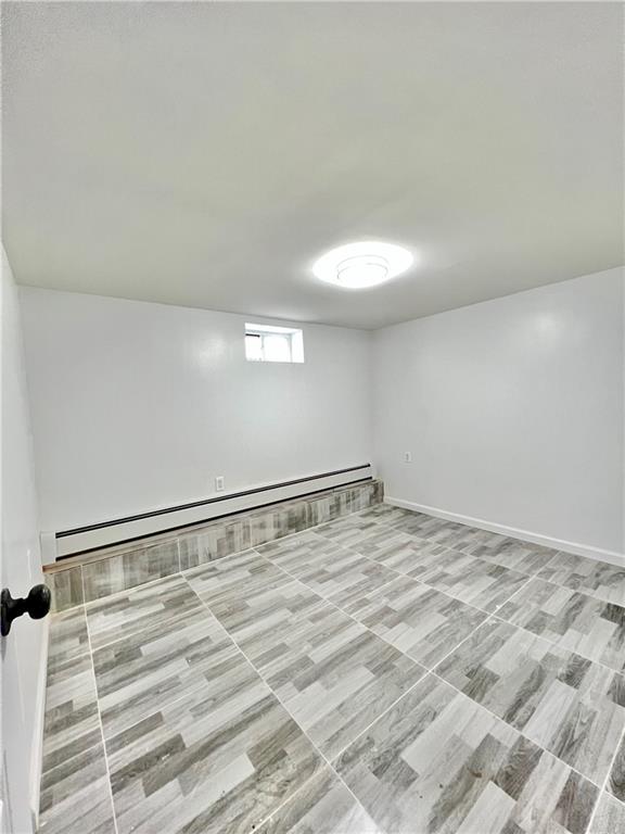 1651 85th Street Brooklyn, NY 11214 - Photo 15 of 17 a view of empty room