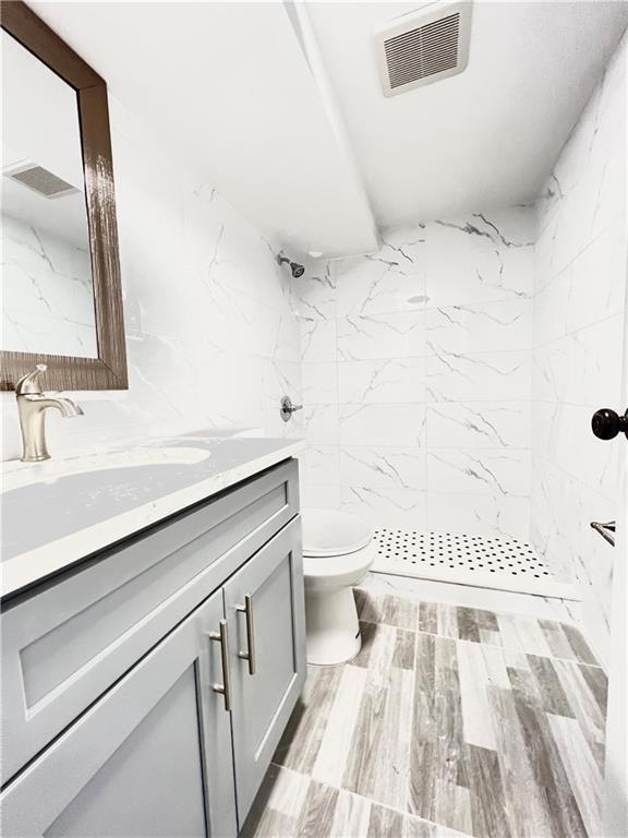 1651 85th Street Brooklyn, NY 11214 - Photo 16 of 17 a bathroom with a sink and a mirror