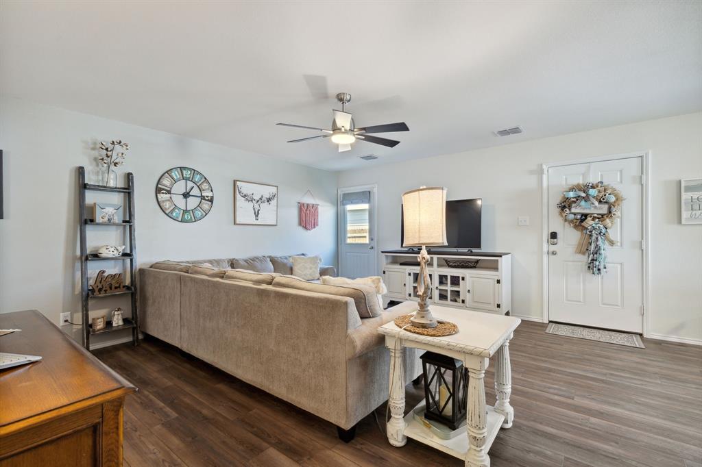 5513 Berea Street Forney, TX 75126 - Photo 10 of 29 Plenty of space in the living room for family and guests.