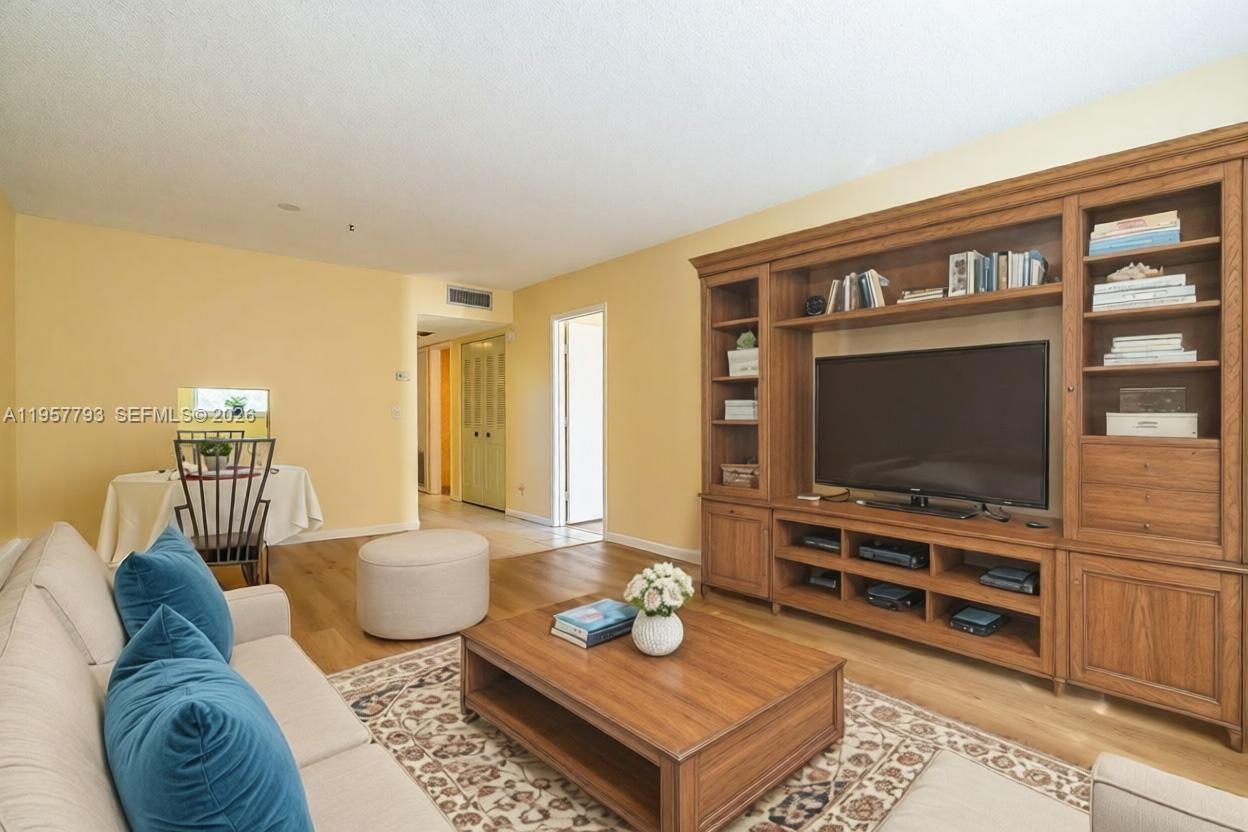 200 Ashbury Road, Unit 205 Hollywood, FL 33024 - Photo 21 of 41 Staged great room