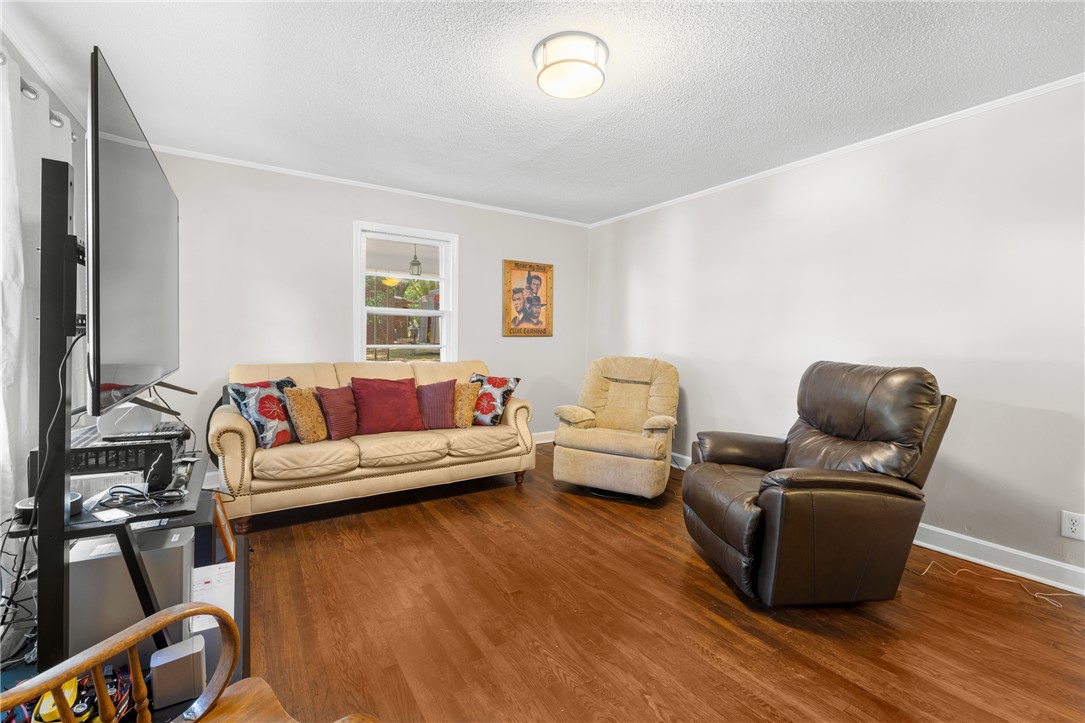 308 Buchanan Circle Pendleton, SC 29670 - Photo 3 of 19 This inviting living space features gleaming hardwood floors and ample natural light.