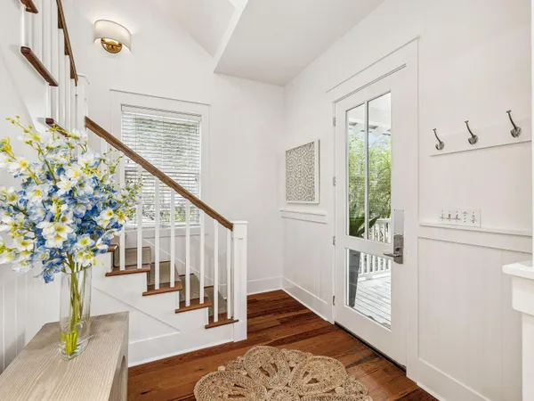 a view of entryway with wooden floor
