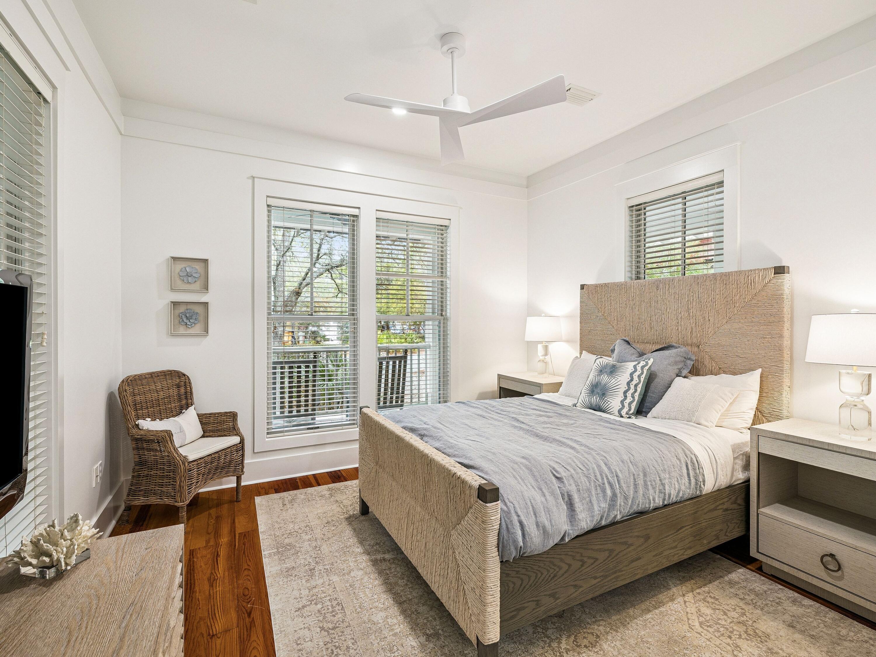 90 Silver Laurel Way Santa Rosa Beach, FL 32459 - Photo 13 of 45 a bedroom with a bed and a large window