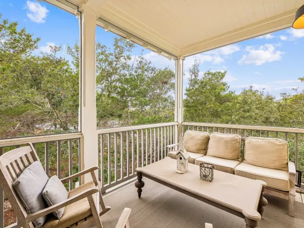 a balcony with furniture