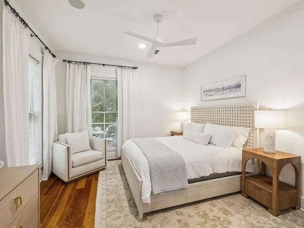 a bedroom with a bed and a couch