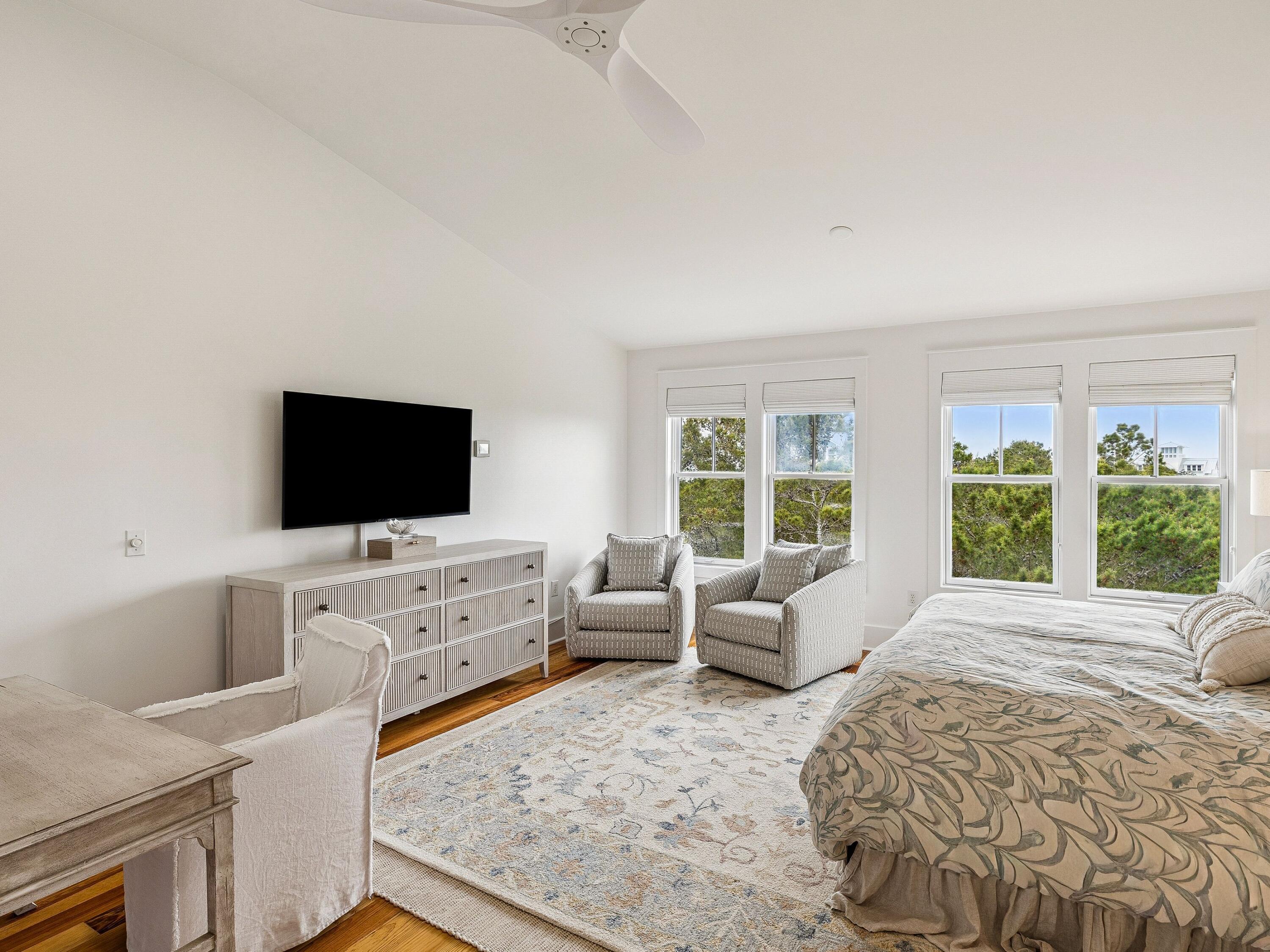 90 Silver Laurel Way Santa Rosa Beach, FL 32459 - Photo 31 of 45 a living room with furniture and a flat screen tv