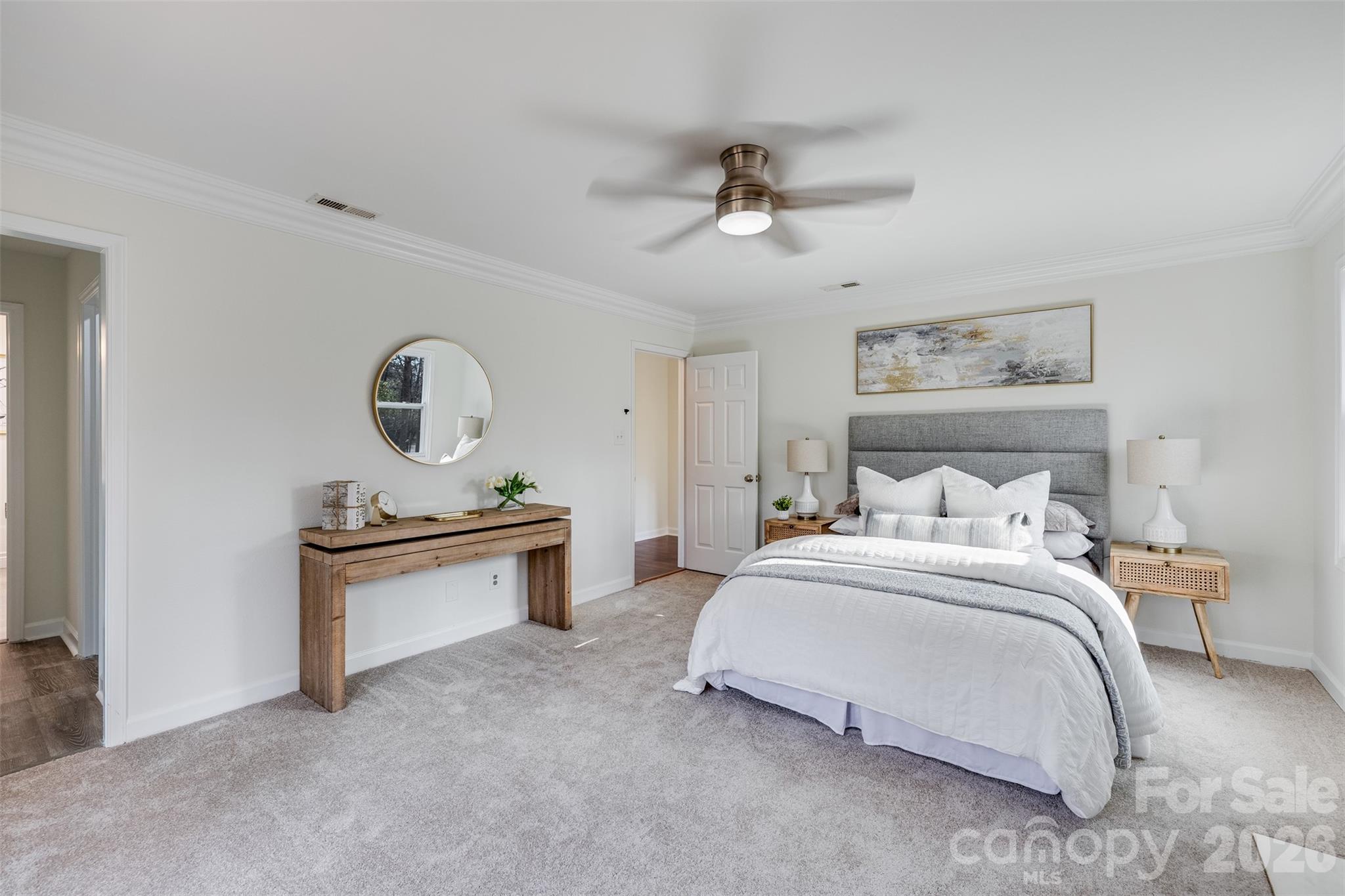 8 Hickory Ridge Court Lake Wylie, SC 29710 - Photo 15 of 37 a bedroom with a bed and ceiling fan