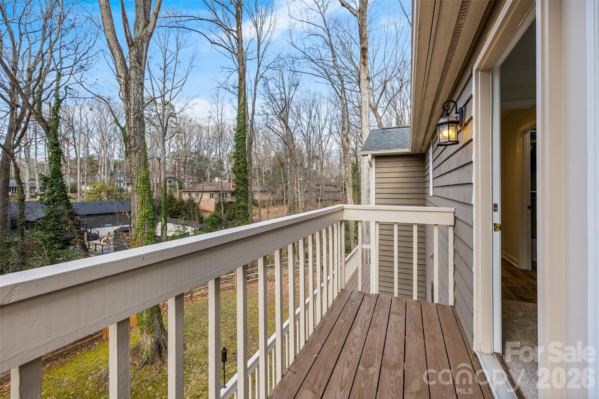 8 Hickory Ridge Court Lake Wylie, SC 29710 - Photo 20 of 37 a view of a wooden house with a large window