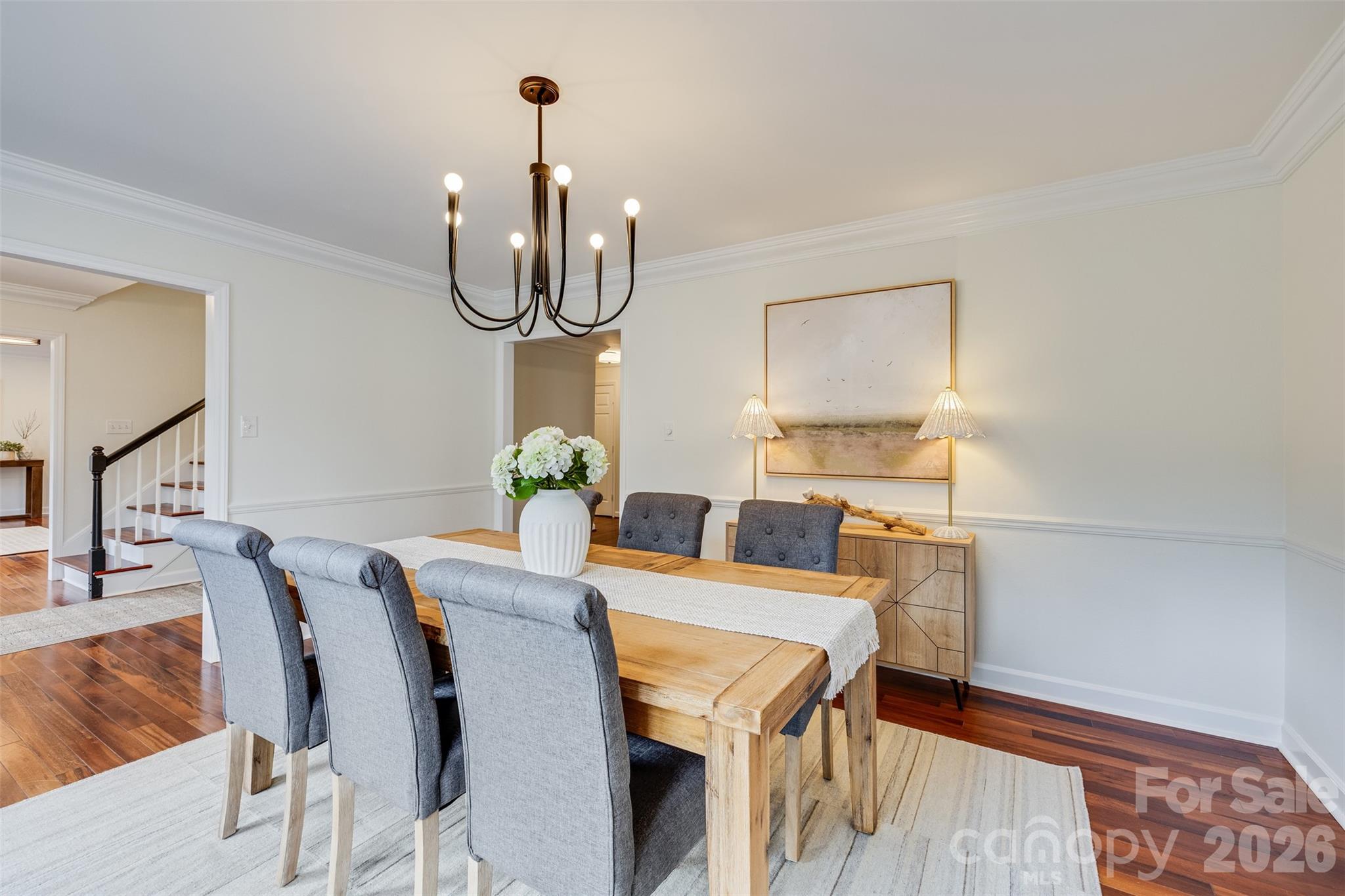 8 Hickory Ridge Court Lake Wylie, SC 29710 - Photo 2 of 37 a view of a dining room with furniture and chandelier