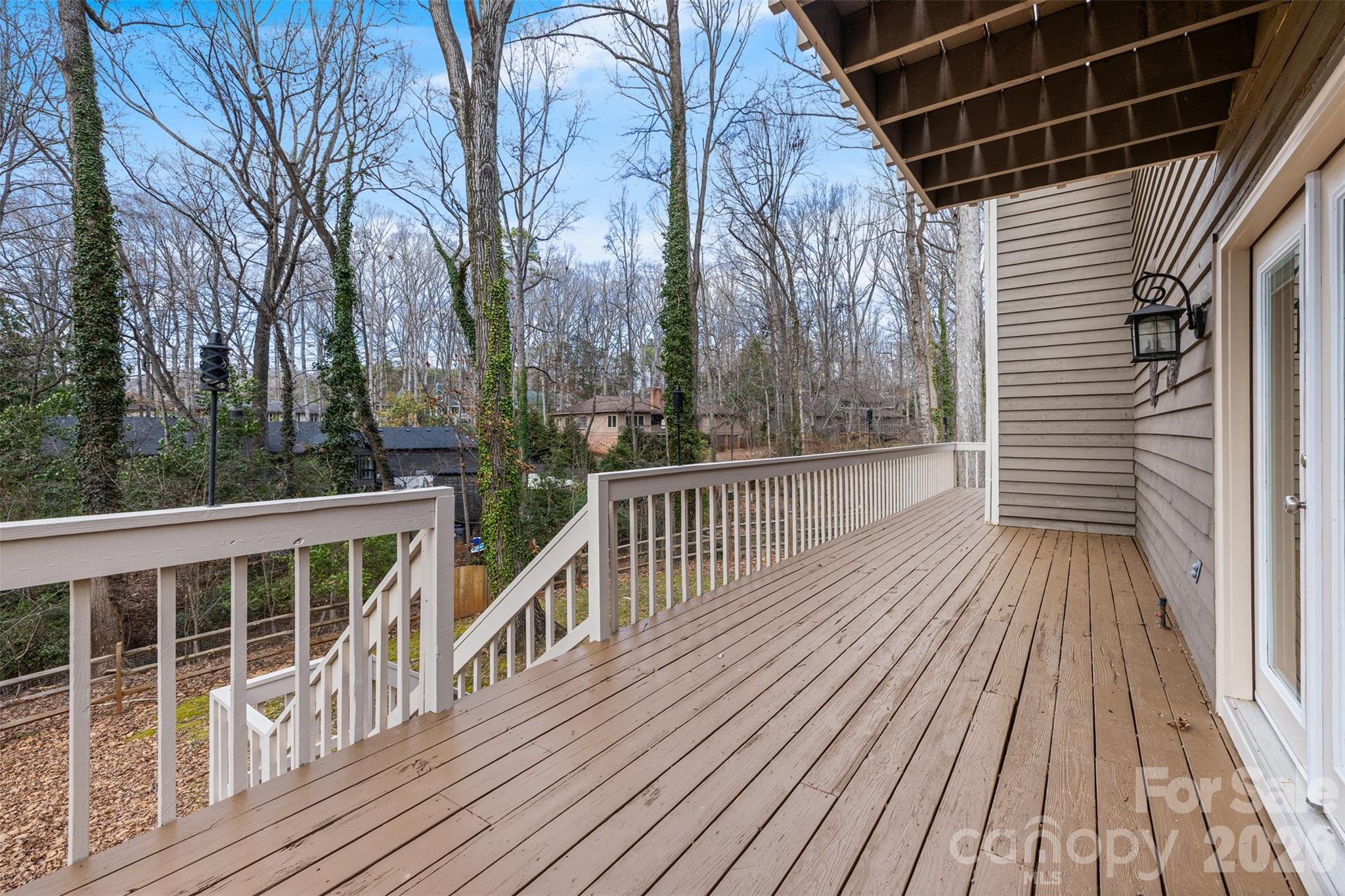 8 Hickory Ridge Court Lake Wylie, SC 29710 - Photo 25 of 37 a view of a balcony with wooden floor and fence