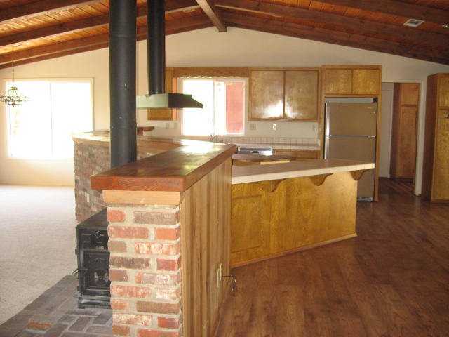 14281 Cane Road Valley Center, CA 92082 - Photo 2 of 24 Living room/dining area to left. Family room/breakfast area to right.