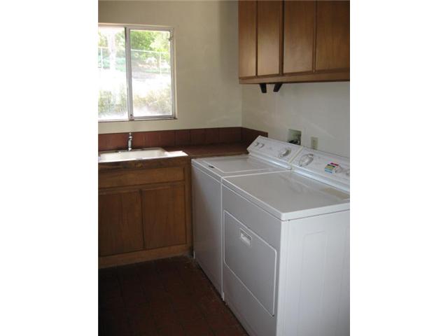 14281 Cane Road Valley Center, CA 92082 - Photo 15 of 24 Sink and ample storage.
