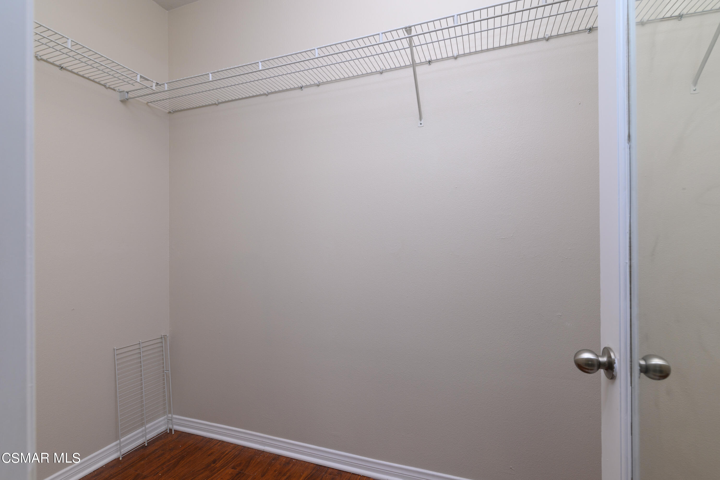 4120 Paredo Way, Unit C Simi Valley, CA 93063 - Photo 13 of 24 a view of a room with racks on the wall
