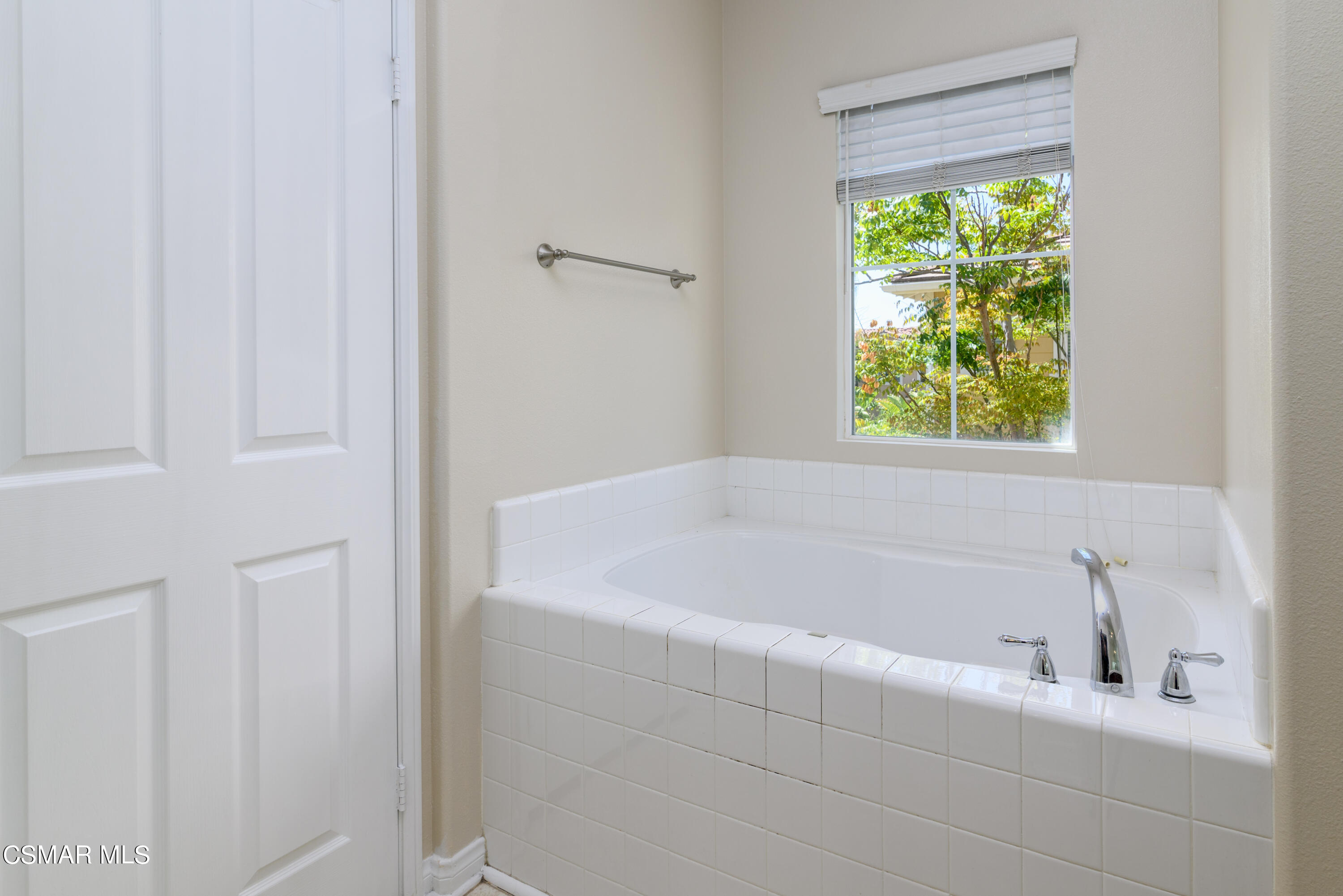 4120 Paredo Way, Unit C Simi Valley, CA 93063 - Photo 16 of 24 a white bath tub sitting next to a window
