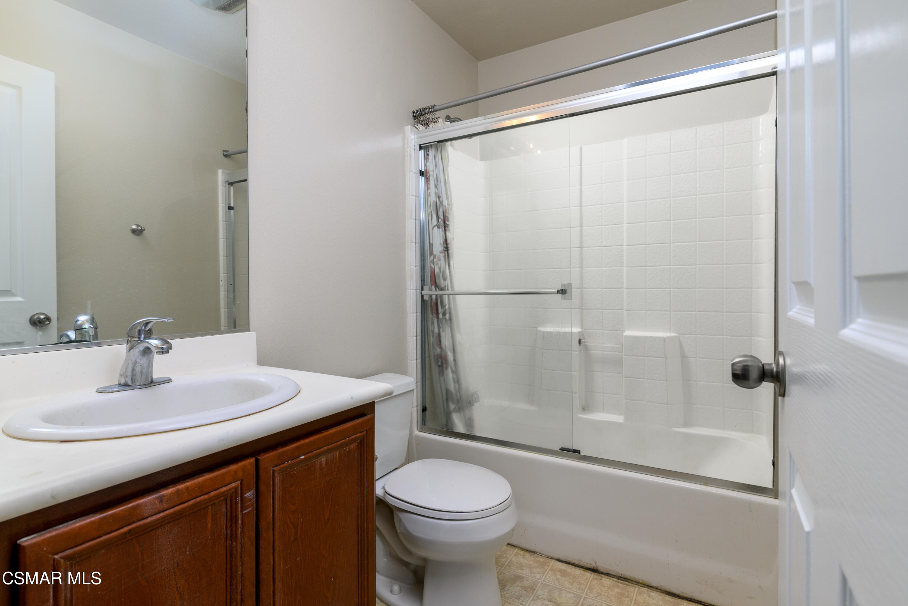 4120 Paredo Way, Unit C Simi Valley, CA 93063 - Photo 19 of 24 a bathroom with a sink toilet and shower
