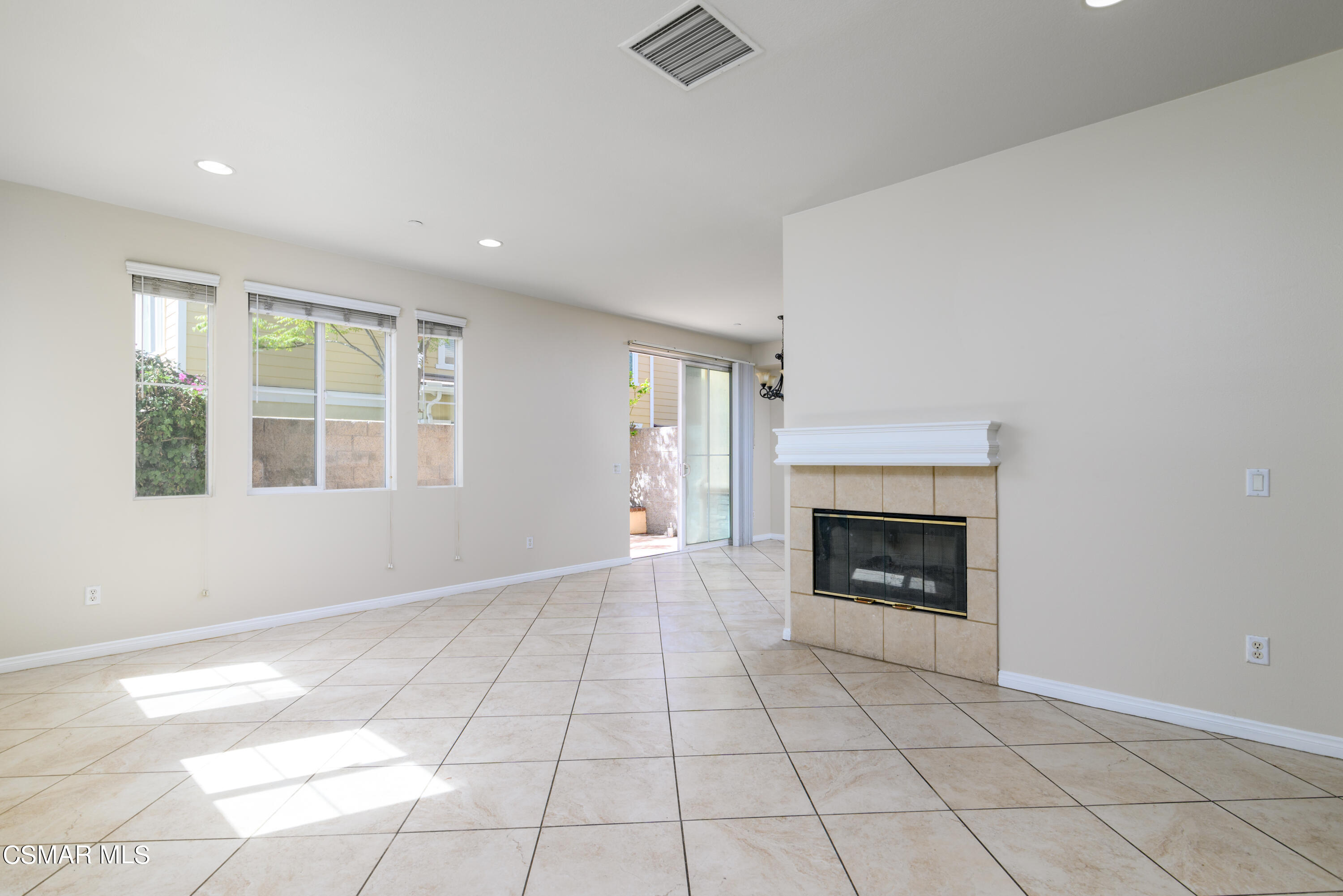4120 Paredo Way, Unit C Simi Valley, CA 93063 - Photo 2 of 24 an empty room with windows and fireplace