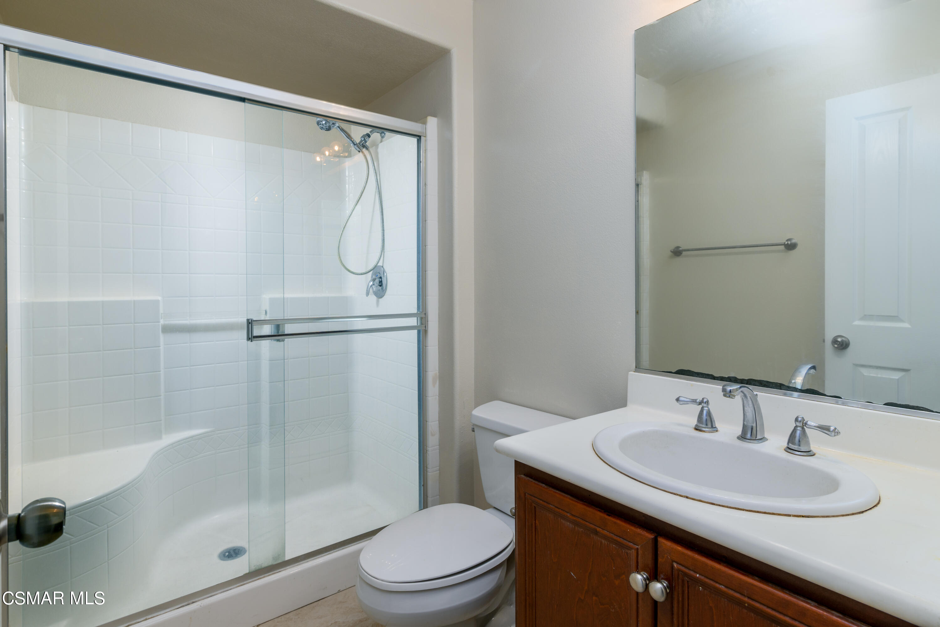 4120 Paredo Way, Unit C Simi Valley, CA 93063 - Photo 9 of 24 a bathroom with a granite countertop sink toilet and shower