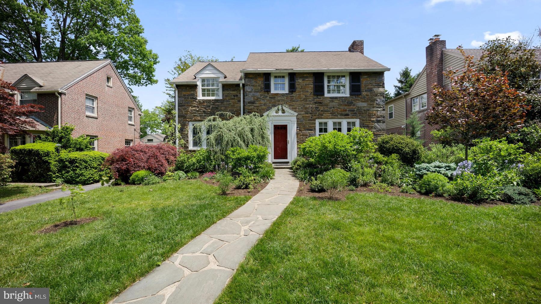 517 Monroe Road Merion Station, PA 19066 - Photo 1 of 40 a front view of a house with a yard