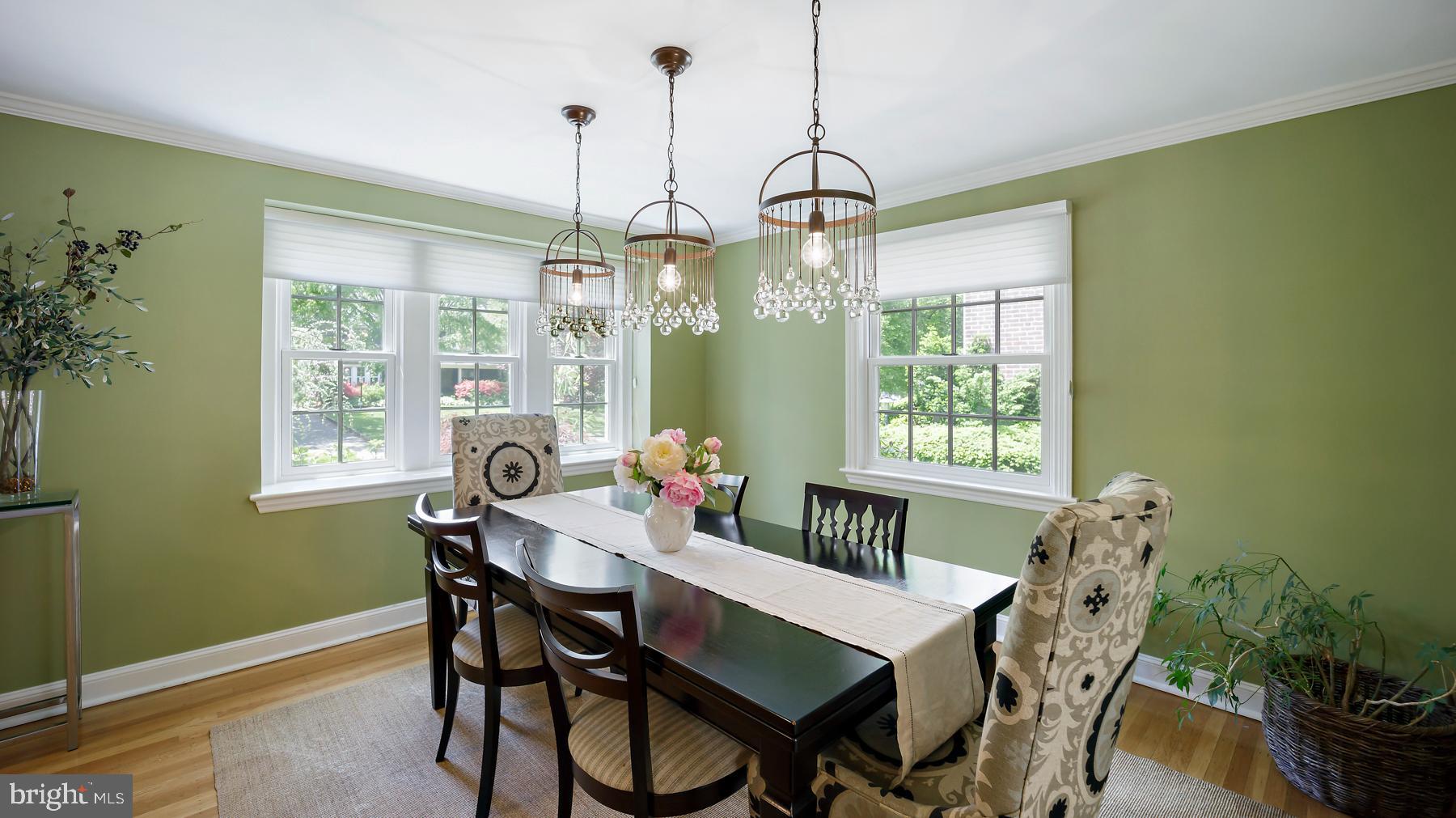 517 Monroe Road Merion Station, PA 19066 - Photo 13 of 40 a dining room with furniture a chandelier and wooden floor