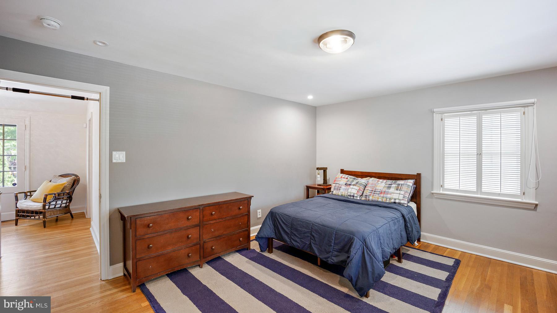 517 Monroe Road Merion Station, PA 19066 - Photo 30 of 40 a bedroom with a bed and wooden floor