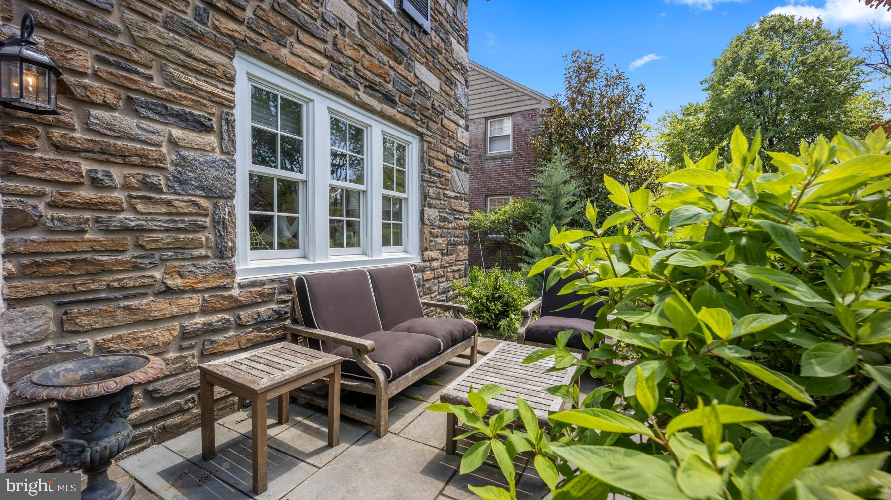 517 Monroe Road Merion Station, PA 19066 - Photo 8 of 40 a view of a patio with table and chairs and potted plants