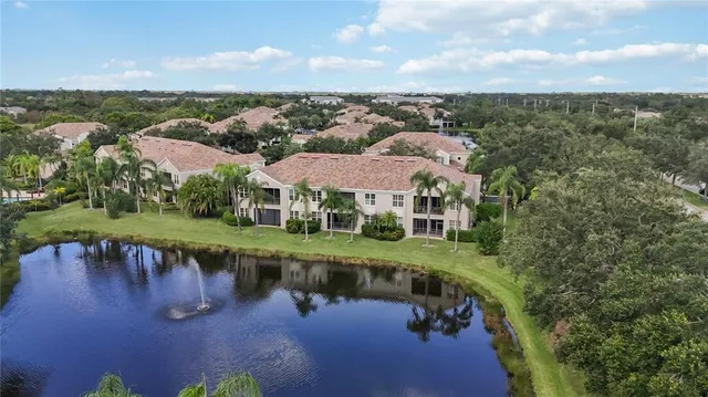 a view of a lake with a yard