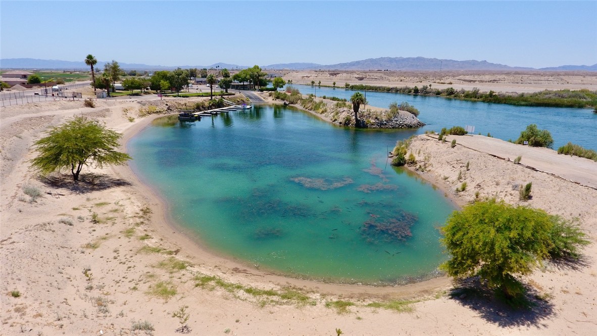 8257 Green Valley Road Mohave Valley, AZ 86440 - Photo 37 of 41 Private cove featuring clear water and a sandy shoreline