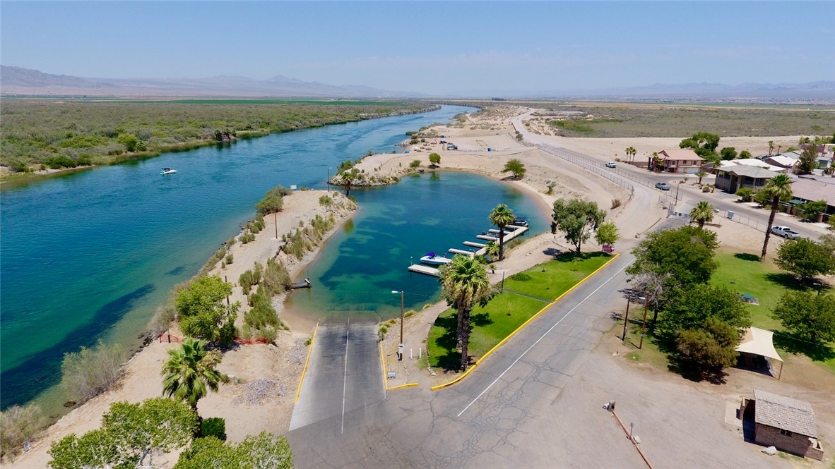 8257 Green Valley Road Mohave Valley, AZ 86440 - Photo 38 of 41 Riverfront property featuring a private boat launch, multiple boat docks, and direct river access