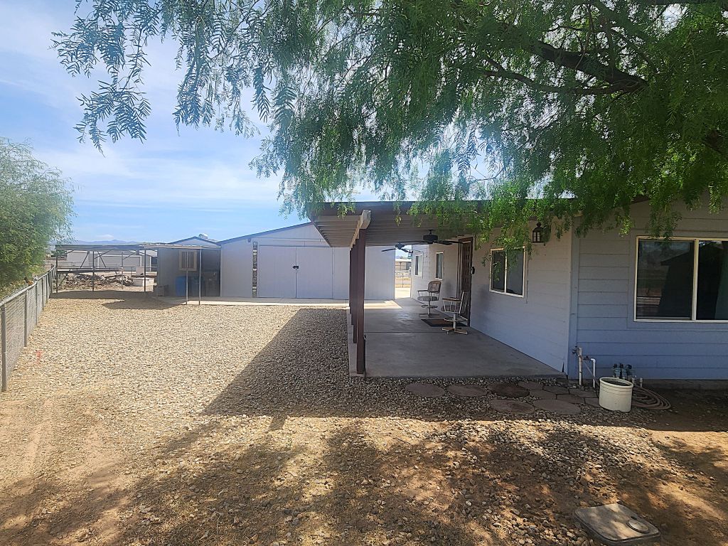 8257 Green Valley Road Mohave Valley, AZ 86440 - Photo 10 of 41 Exterior featuring a covered patio with a covered patio, ceiling fans, and recessed lighting