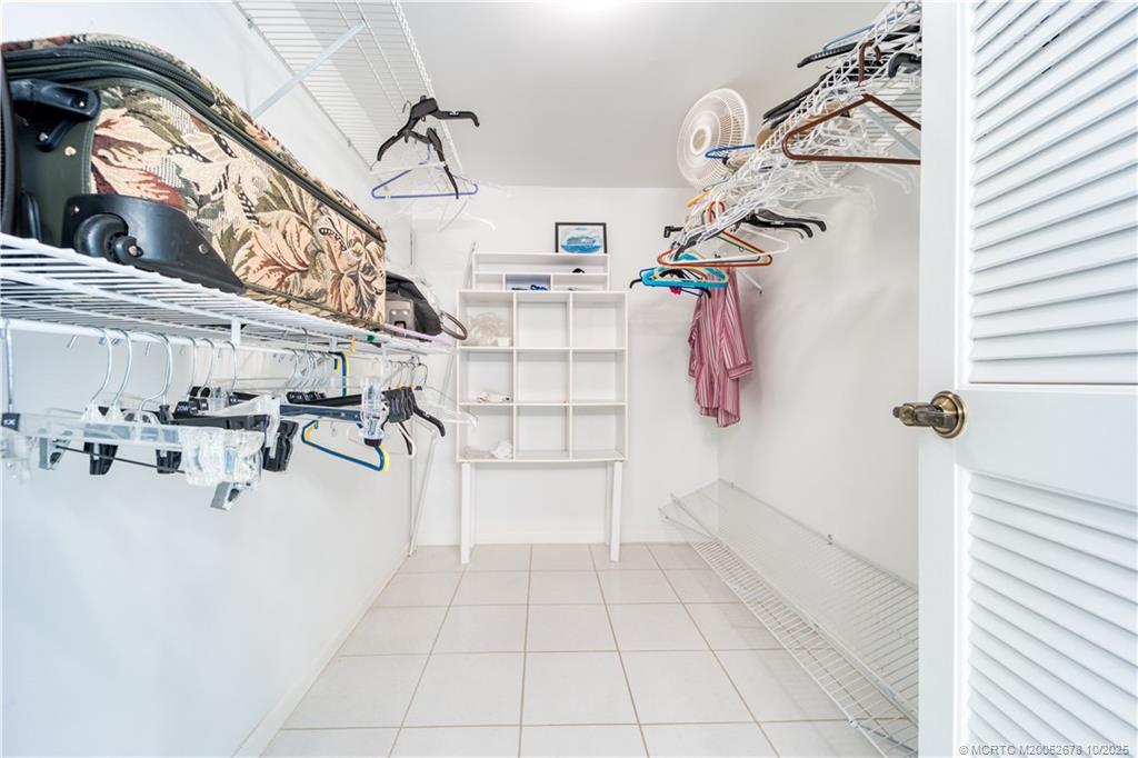 3100 Southeast Pruitt Road, Unit B301 Port St. Lucie, FL 34952 - Photo 24 of 48 a view of a room with gym equipment