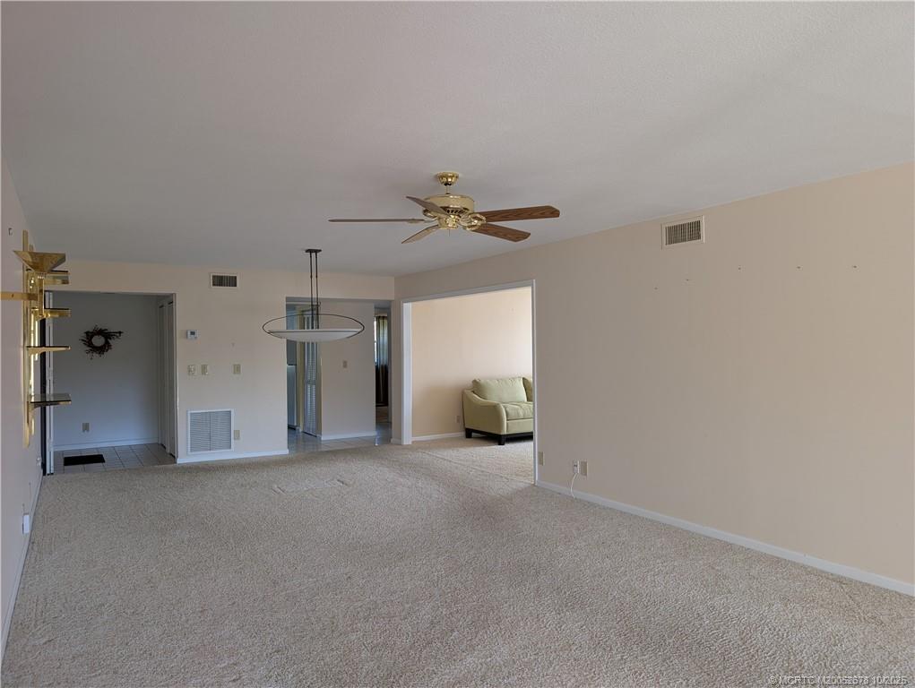 3100 Southeast Pruitt Road, Unit B301 Port St. Lucie, FL 34952 - Photo 27 of 48 a view of a livingroom with a fireplace