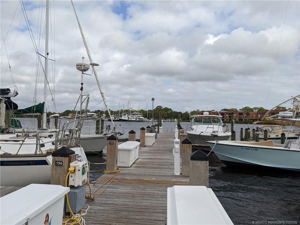 3100 Southeast Pruitt Road, Unit B301 Port St. Lucie, FL 34952 - Photo 46 of 48 a couple of boats are docked in a harbor