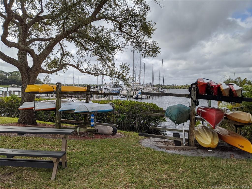 3100 Southeast Pruitt Road, Unit B301 Port St. Lucie, FL 34952 - Photo 47 of 48 a view of a garden with furniture