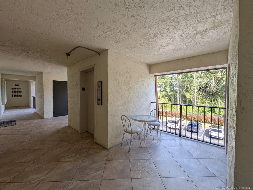 3100 Southeast Pruitt Road, Unit B301 Port St. Lucie, FL 34952 - Photo 7 of 48 a view of a livingroom with furniture